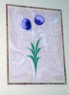 Painting of two purple flowers with green leaves on abstract muted pink background